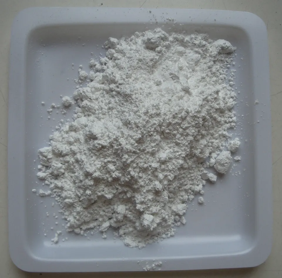 Fine white calcium carbonate powder heaped on a tray